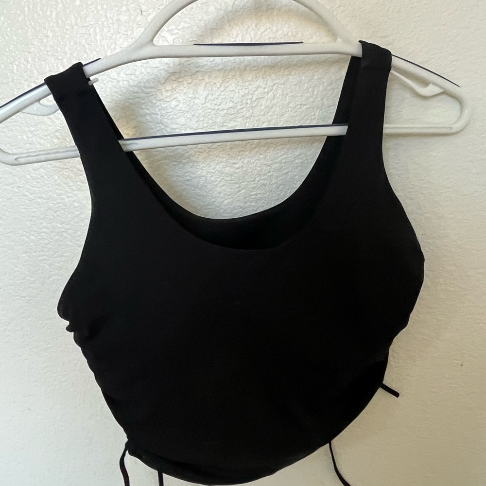 Mono B tank w sports bra. Strings on each side to pull up and make tank shorter.